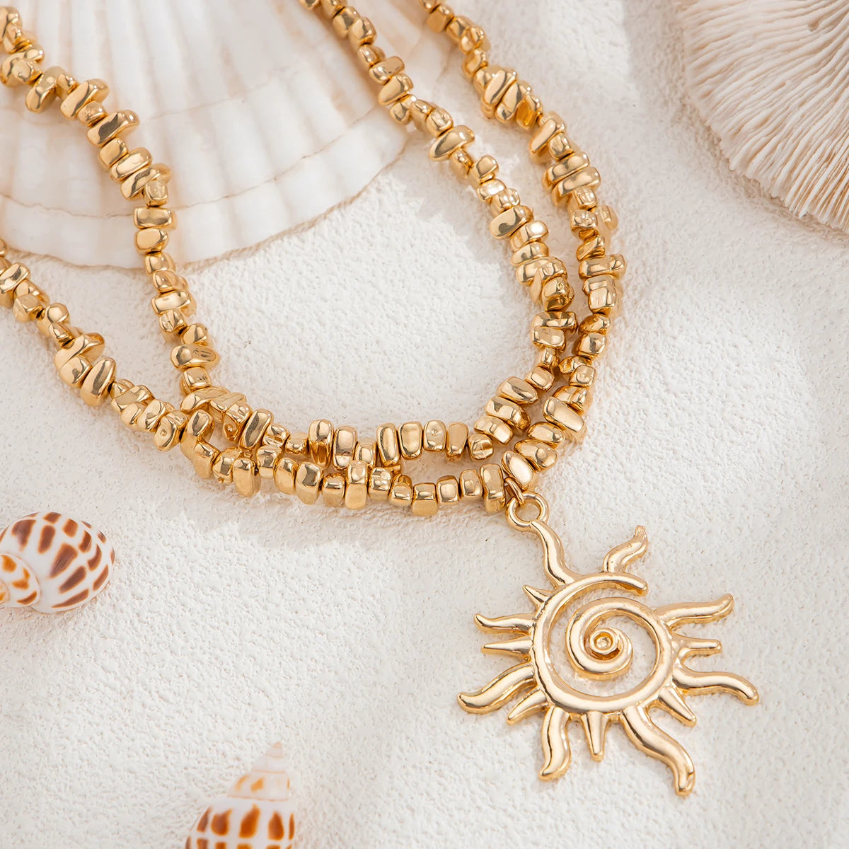 Lucia Gole – Gold Spiral & Sun Pendant Necklace