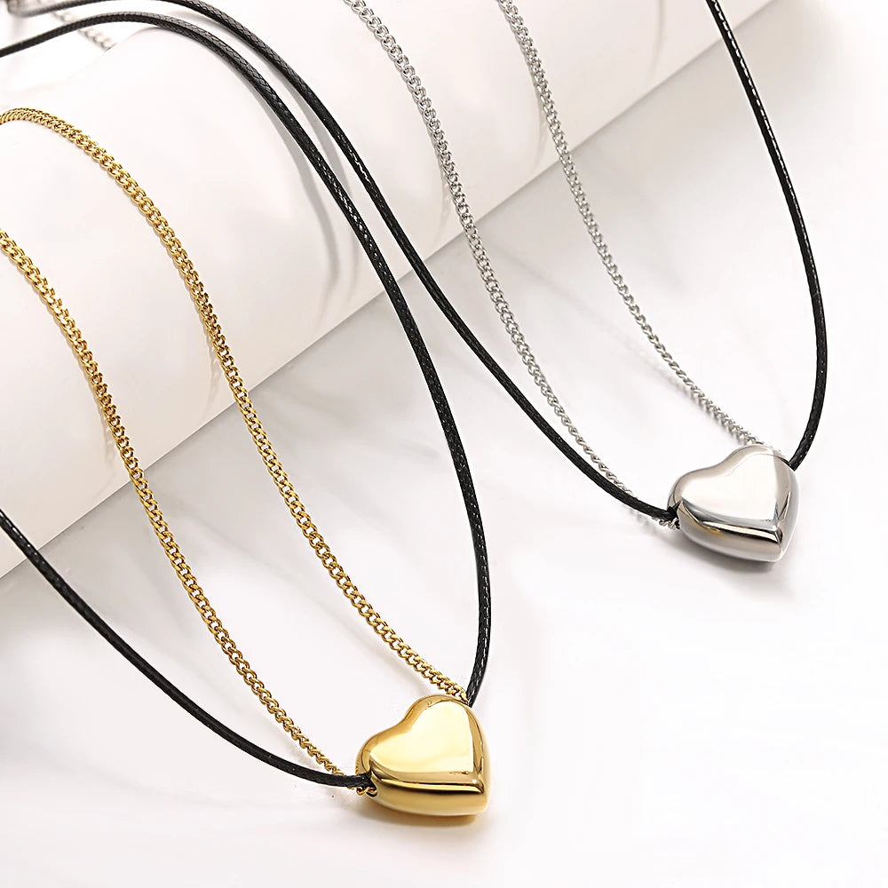 Lucia Gole: Heart Pendant Black Leather Choker Necklace