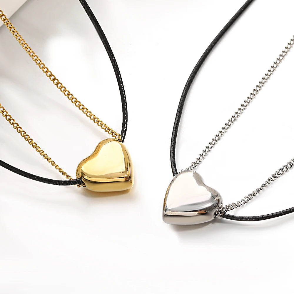 Lucia Gole: Heart Pendant Black Leather Choker Necklace