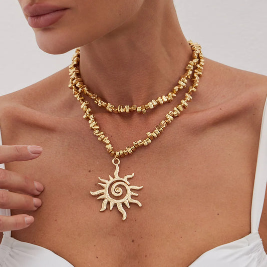 Lucia Gole – Gold Spiral & Sun Pendant Necklace