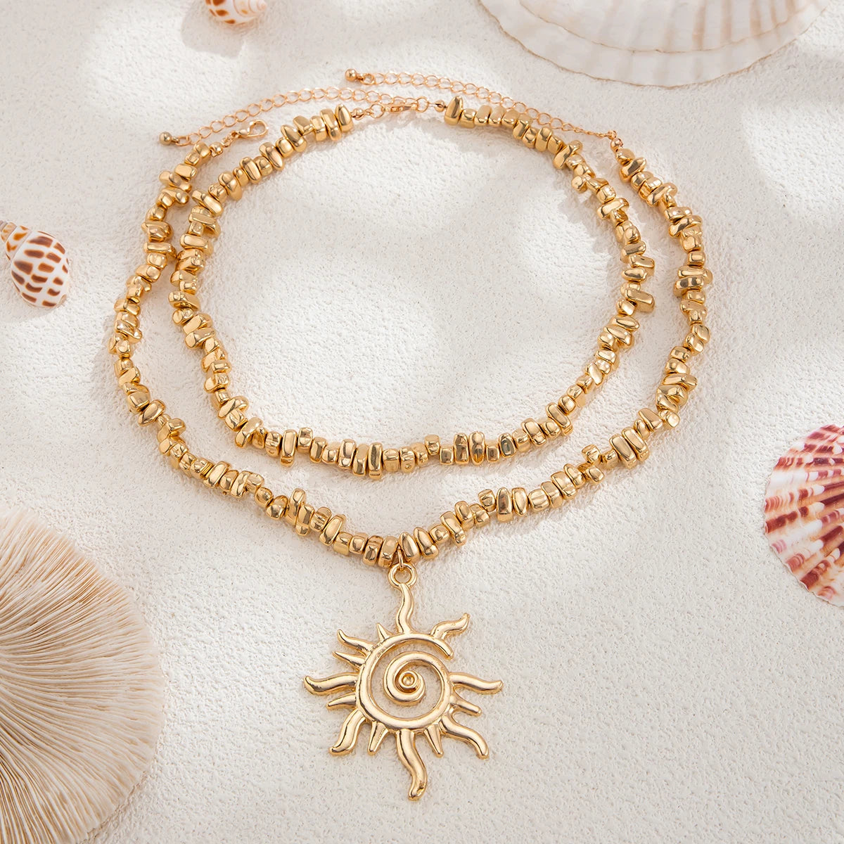 Lucia Gole – Gold Spiral & Sun Pendant Necklace