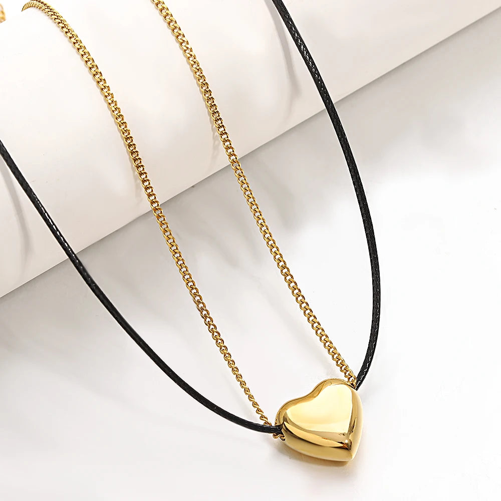 Lucia Gole: Heart Pendant Black Leather Choker Necklace