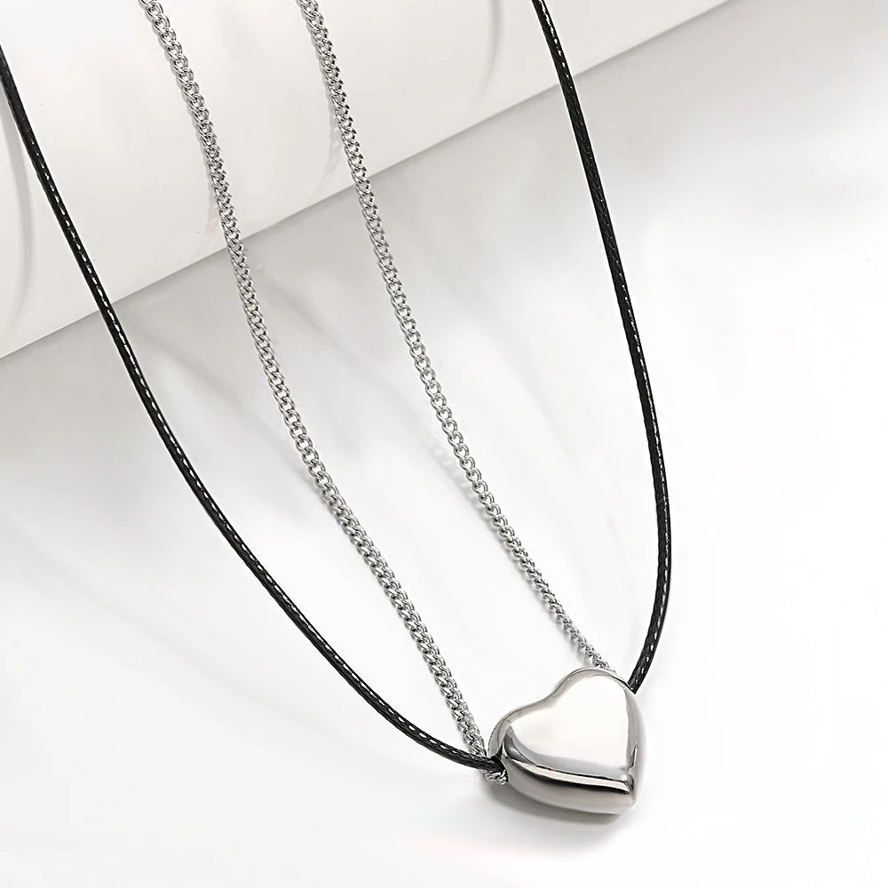 Lucia Gole: Heart Pendant Black Leather Choker Necklace